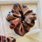 Geometric Xiangyun silk scrunchie on hair